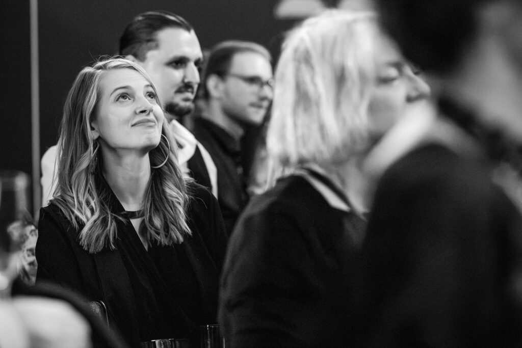Emotional guest looking up during speeches at the Oxford Natural History Museum