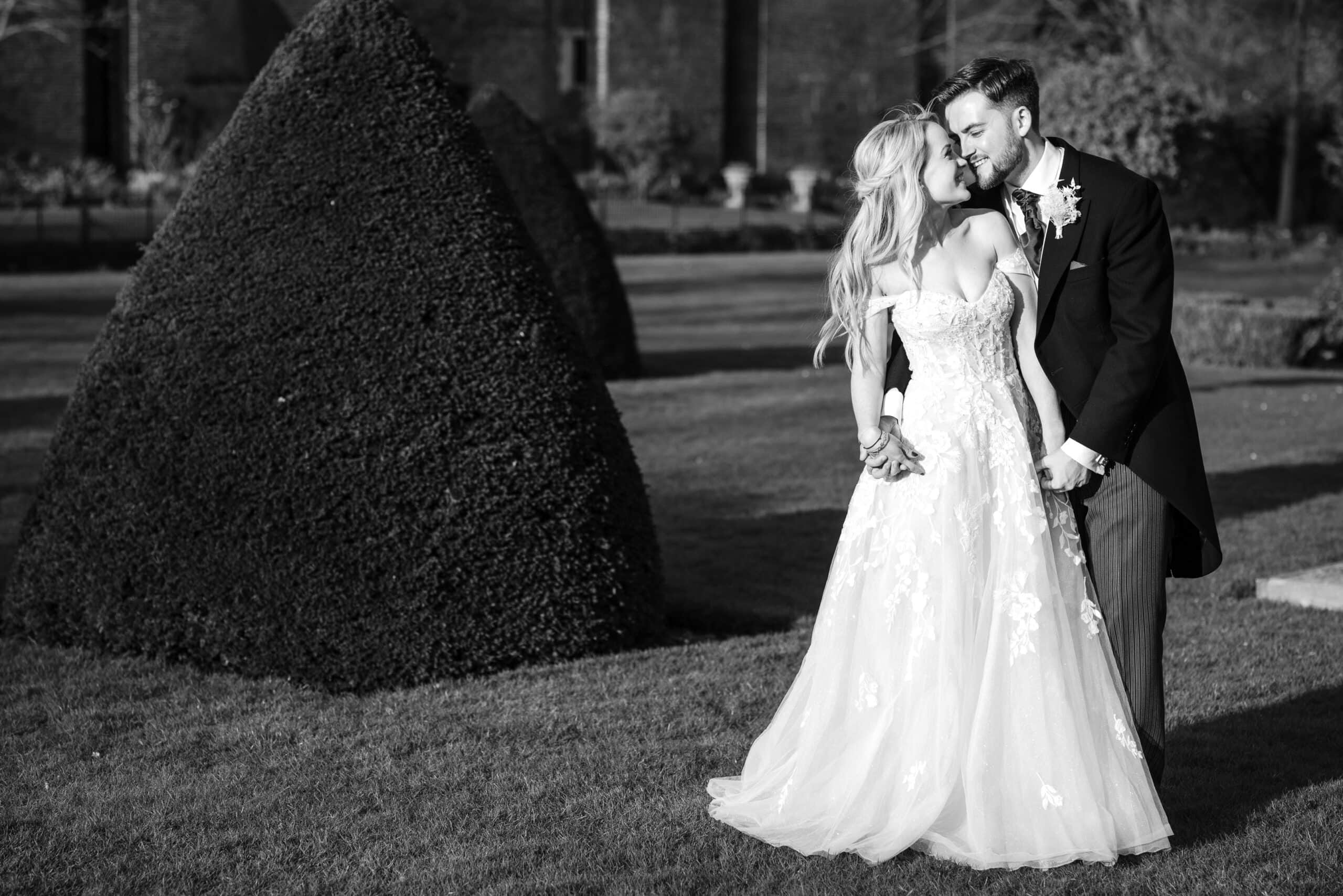 Bride and Groom in gardens at Chenies Manor