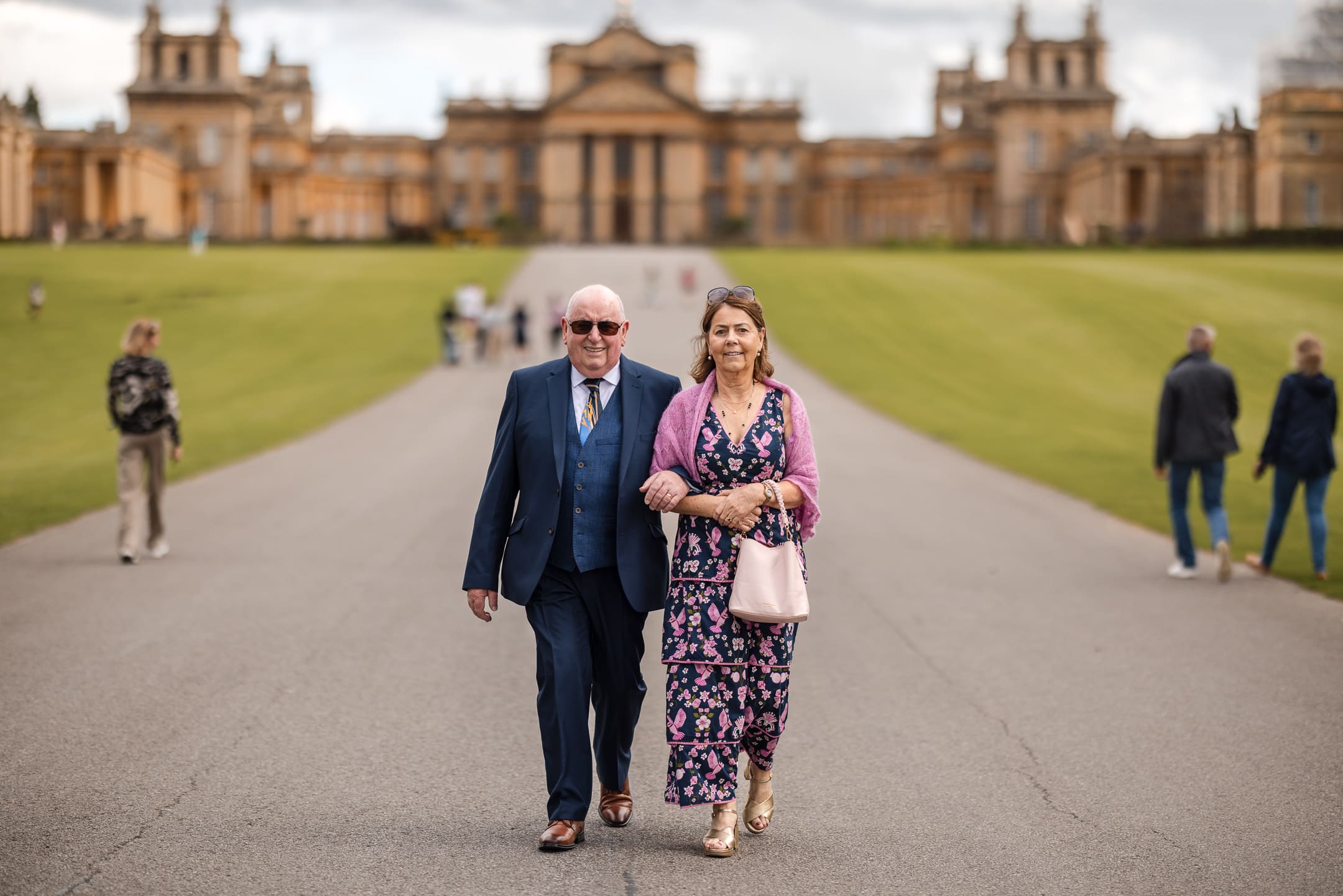 Father and mother of the Bride walking in the grounds of Blenheim Palace