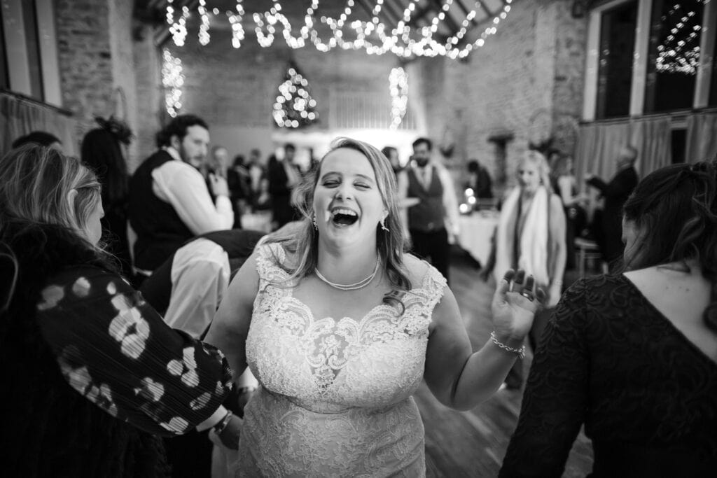 Bride having fun on the dance floor at Ayhno
