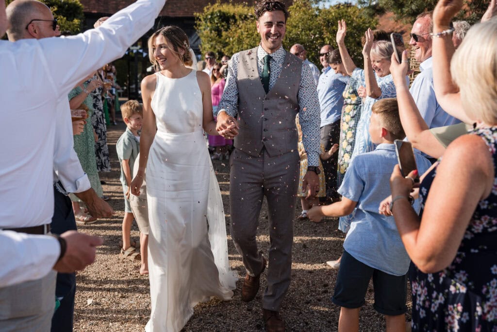 Bride and Groom confetti walk